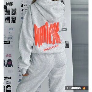 White Fox Boutique Gray Hoodie with Neon Orange Graphic